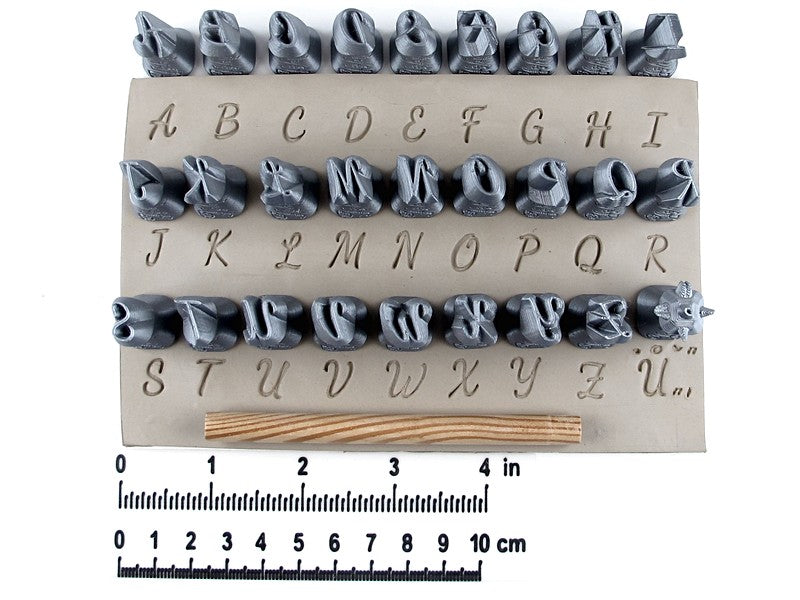 Script alphabet stamps for clay